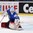 OSTRAVA, CZECH REPUBLIC - MAY 3: Slovenia's Luka Gracnar #40 makes a glove save during preliminary round action at the 2015 IIHF Ice Hockey World Championship. (Photo by Richard Wolowicz/HHOF-IIHF Images)

